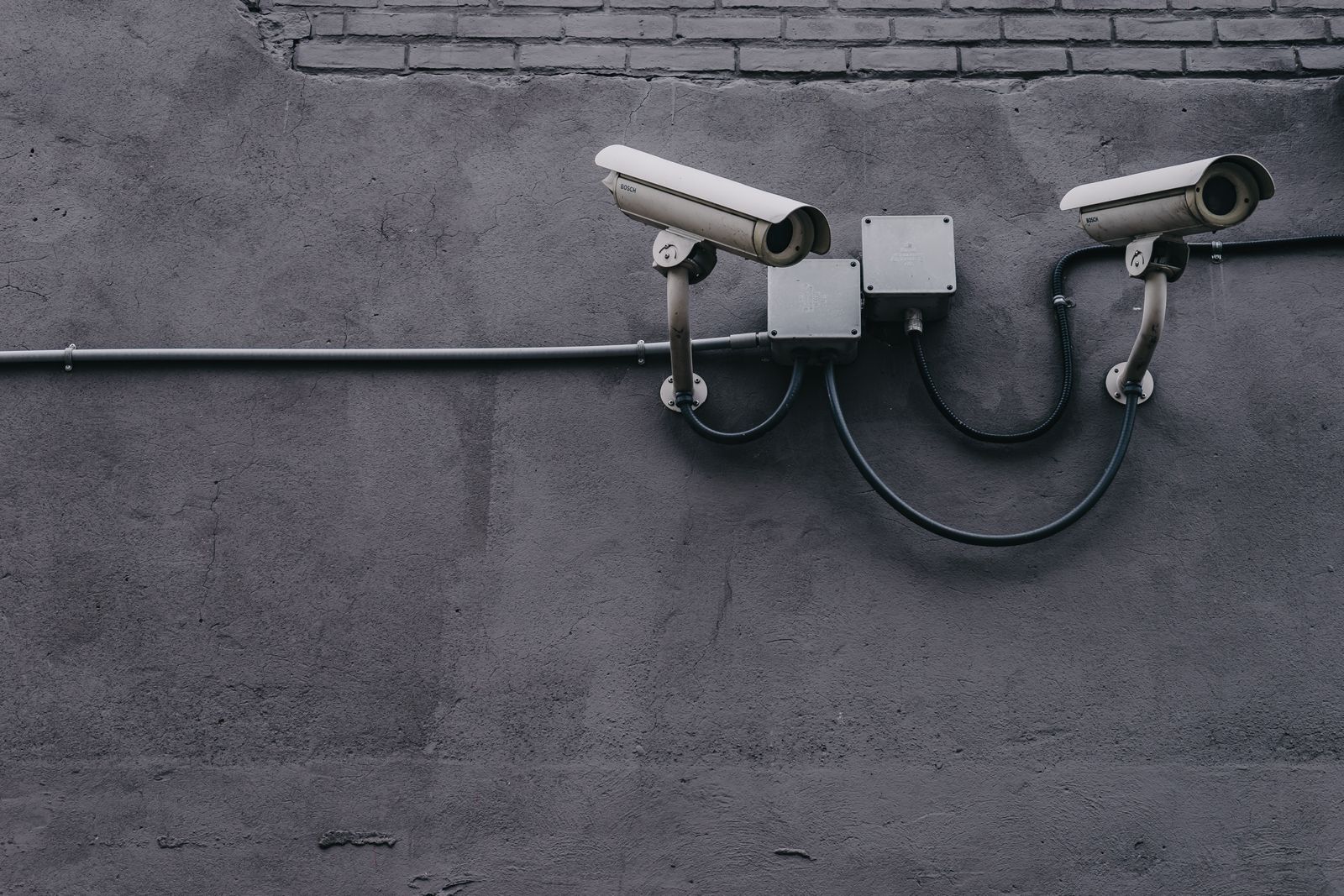 CCTV cameras mounted at a residential gate